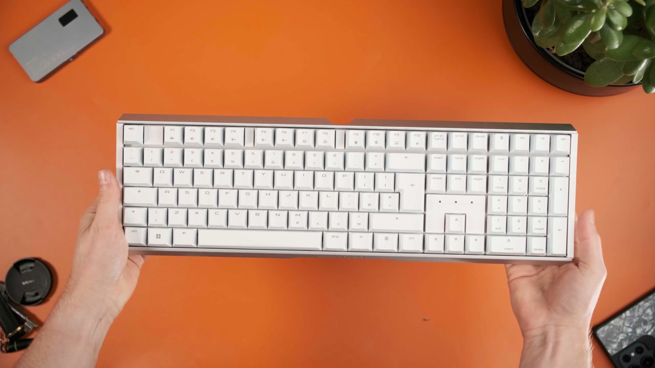 CHERRY XTRFY MX 3.1 keyboard unboxed on an orange desk